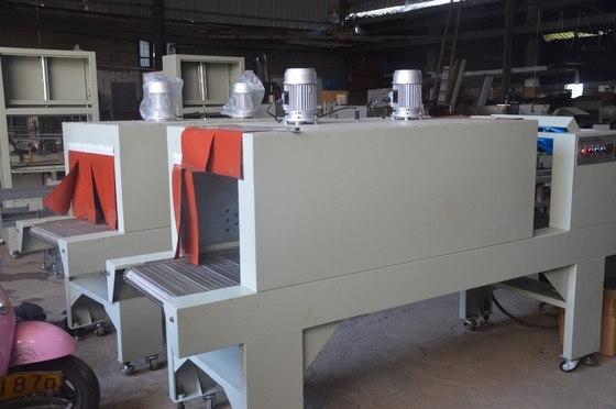 Máquina semiautomática para envolver botellas de aceite con túnel de contracción térmica y tipo de película PE