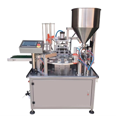 Máquina de llenado y sellado de jugo de copa rotativa de 2 agujeros para línea de embalaje de capacidad 380 KG